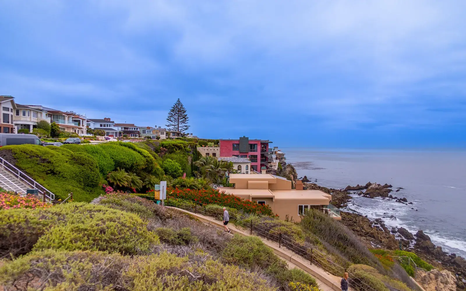 Hillside landscaping and buildings above the Pacific coastline near Costa Mesa, CA